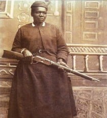 Mary Fields (c. 1832 – 1914), the first African-American woman employed as a mail carrier in the United States; circa 1895; author unknown; public domain.